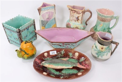 Lot 279 - Collection of 19th century majolica, to include a dish depicting a fish and other creatures, jugs, jardiniere, etc. (8)