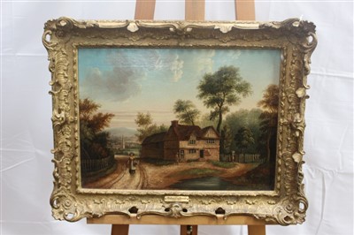 Lot 1338 - Robert Ladbrooke (1769-1842) oil on canvas - figures before a country cottage with a church beyond, in gilt frame, 33cm x 44cm 
 Provenance: Eastbourne Fine Art, June 11th 1977