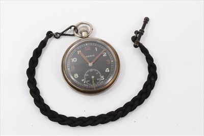 Lot 510 - Second World War Moeris G.S.T.P open face pocket watch, with black dial, luminous Arabic numerals, minute, subsidiary seconds and button wind movement, rear of case, stamped G.S.T.P, M14093