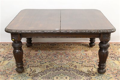 Lot 1703 - Large late 19th century carved oak extending dining table