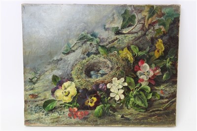 Lot 1403 - Attributed to Oliver Clare (1853-1927) oil - a birds nest and flowers on a mossy bank, unframed, 29cm x 37cm