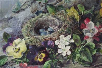Lot 1403 - Attributed to Oliver Clare (1853-1927) oil - a birds nest and flowers on a mossy bank, unframed, 29cm x 37cm