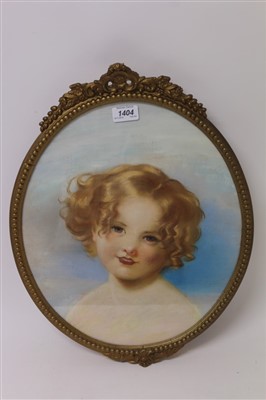 Lot 1404 - English school, circa 1900, oval pastel - study of a pretty girl with auburn hair, in gilt frame, 38cm x 34cm