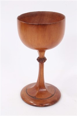 Lot 1238 - 19th century carved sycamore Gothic Revival chalice, 14cm high