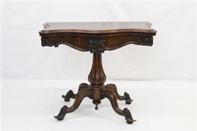 Lot 1666 - Victorian rosewood serpentine fronted card table standing on central column with four scroll cabriole legs