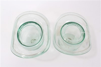 Lot 136 - Two Victorian green glass novelty vases in the form of top hat and bowler hat with fold over rims , 9-10.5cm