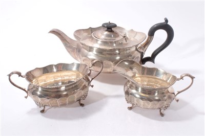 Lot 551 - 1920's Silver three piece tea set of cauldron form (Birmingham 1926)