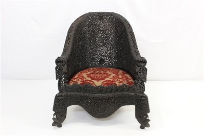 Lot 1628 - 19th century Ceylonese carved hardwood throne chair