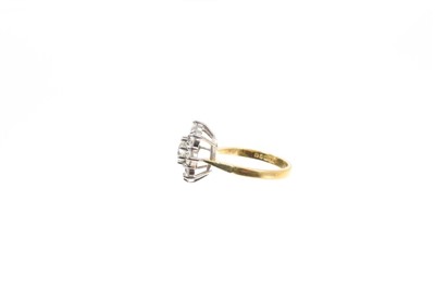 Lot 753 - Diamond cluster ring with a flower head cluster of nine brilliant cut diamonds in claw setting on 18ct yellow gold shank.