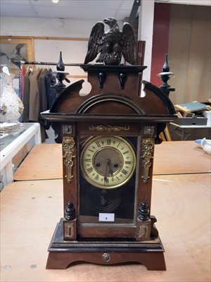 Lot 9 - Wooden mantel clock with brass decoration