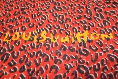 Lot 3122 - Louis Vuitton Red and Black 'Leopard' cashmere and silk scarf designed by Stephen Spouse in  box