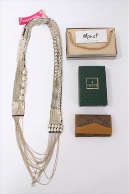 Lot 224 - Designer silvered bead necklace by Fiona Paxton, Monet necklace and Gucci key wallet in box