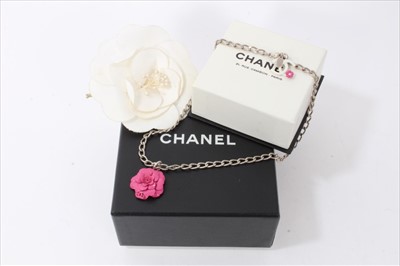 Lot 3350 - Chanel Camélia pink enamel necklace and Chanel Camélia white fabric brooch