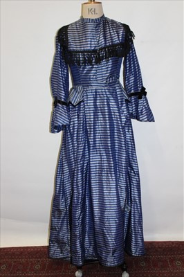 Lot 2228 - Victorian blue and silver dress with black tassel trim ...