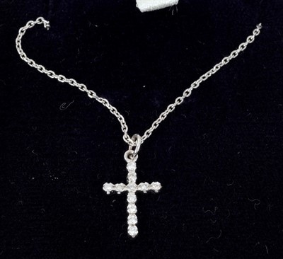 Lot 761 - 18ct white gold and diamond set cross pendant on chain