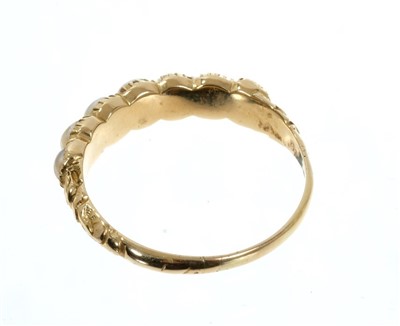 Lot 768 - Georgian gold and pearl half hoop ring with seven half pearls in gold collet setting with foliate shoulders , size O
