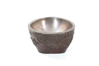 Lot 1280 - Fine Chinese carved bamboo and metal mounted libation cup, tapering form with relief carved panels, seal mark to base, 8cm wide