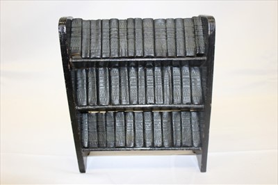 Lot 2676 - The Works of William Shakespeare, 40 miniature volumes, published by Allied Newspapers Ltd, on wooden shelves