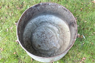 Lot 1751 - Eastern coppered tin vessel, waisted form with strapwork and drop handles, 47cm diameter at rim