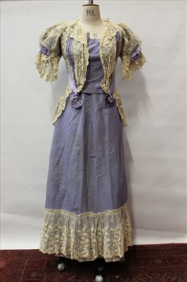 Lot 3088 - Victorain pale lilac grosgrain boned jacket and matching skirt with gathered lace trim.  Skirt has space for a bustle and underskirt has bobbin lace trim. Also a purple silk skirt and jacket with b...