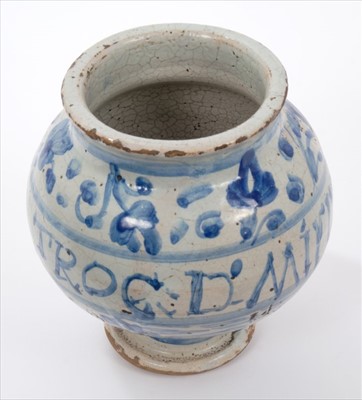Lot 46 - 17th / 18th century Italian tin glazed drug jar, painted in underglaze blue with floral motifs
