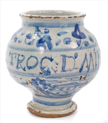 Lot 46 - 17th / 18th century Italian tin glazed drug jar, painted in underglaze blue with floral motifs