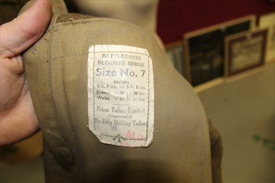 Lot 578 - Second World War British Army Battle Dress blouse with Royal Engineers badges, together with another Battle Dress blouse dated 1940 and other Second World War uniform including a balaclava