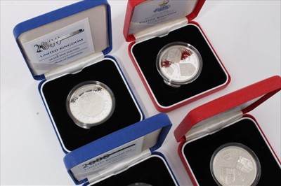 Lot 45 - G.B. The Royal Mint mixed silver proof £5 coins to include 1997 'Golden Wedding Anniversary' x 2 and 2000 'Millennium' x 2 (N.B. all cased and with Certificates of Authenticity) (4 coins)