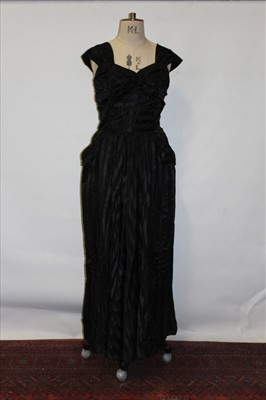 Lot 3097 - 1950's black evening gown with gathered, boned and net lined bodice and full skirt.