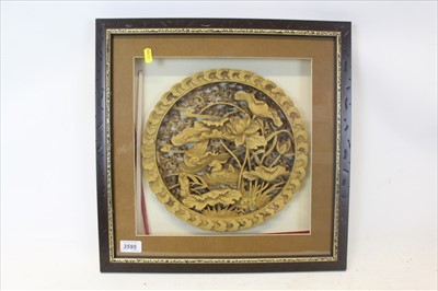 Lot 3595 - Framed Eastern wood carving depicting birds and flowers, probably Indonesian, the frame measuring 44cm across