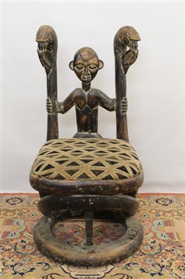 Lot 1765 - Mesopotamian style ornate carved hardwood elbow chair. Provenance: Removed from Gilgamesh restaurant, London