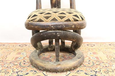 Lot 1765 - Mesopotamian style ornate carved hardwood elbow chair. Provenance: Removed from Gilgamesh restaurant, London