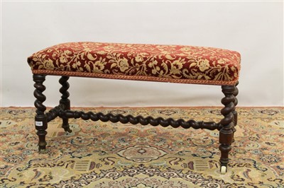 Lot 1783 - Victorian walnut long stool, floral damask upholstery on barley-twist supports and castors