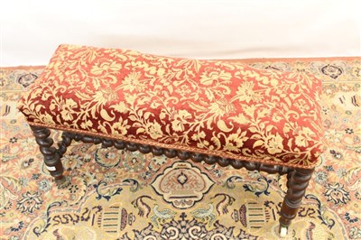 Lot 1783 - Victorian walnut long stool, floral damask upholstery on barley-twist supports and castors