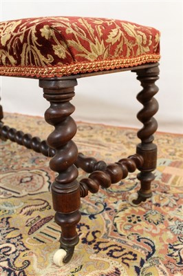 Lot 1783 - Victorian walnut long stool, floral damask upholstery on barley-twist supports and castors