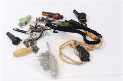 Lot 513 - Collection of whistles to include a military issue bosun's whistle and other Bakelite examples (qty)