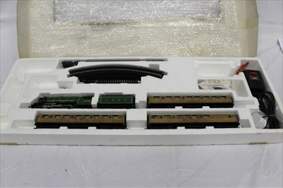 Lot 2908 - Railway Hornby 00 gauge The Boxed Set Orient Express R1038, The Flying Scotsman R869, Harry Potter Hogwarts Express all boxed (boxes have water damage)