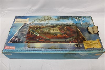 Lot 2908 - Railway Hornby 00 gauge The Boxed Set Orient Express R1038, The Flying Scotsman R869, Harry Potter Hogwarts Express all boxed (boxes have water damage)