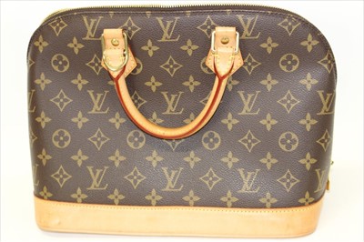 Lot 3110 - Louis Vuitton Monogram Canvas Handbag with leather handles and base. FL00811