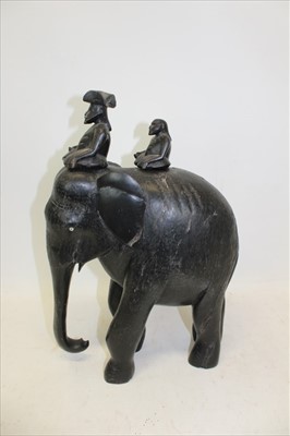 Lot 3635 - Large carved ebony elephant with two riders