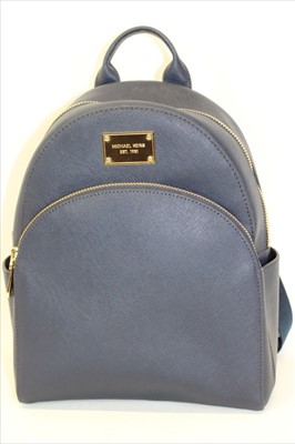 Lot 3113 - Michael Kors Dark Blue Saffiano leather Backpack with engraved zippers and circular logo lining.