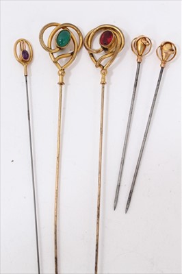 Lot 3241 - Pair gold 9ct hat pins and three other gilt metal gem set hat pins (5)