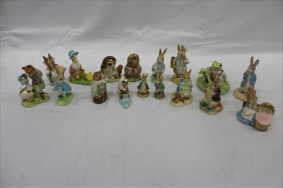 Lot 2114 - Thirteen Beswick Beatrix Potter figures - Jemima and her ducklings,  Old Mr Brown,  Peter and the red Pocket Handkerchief,  Jemima Puddleduck with Foxy Whiskered Gentleman,  Mrs Rabbit,  Tomasina T...