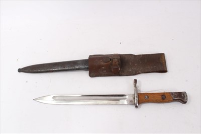 Lot 703 - Spanish Mauser bayonet with scabbard and leather frog.