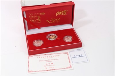 Lot 79 - China - People's Bank of China special Millenium Edition of China Lucky silver 3 coin set 2000 (N.B. cased with Cetificate of Authenticity) (1 coin set)