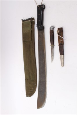 Lot 719 - Second World War British Military Machete dated 1945, and two other daggers