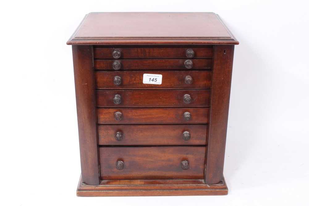 Lot 145 - Collectors Cabinet - a dark wood stained early 20th century seven drawer cabinet.  Ideal storage for coins or other small collectables (1 item)