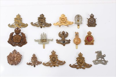 Lot 530 - Collection of cap badges to include The Norfolk Volunteers, other Yeomanry Regiments and Royal Artillery badges (15)