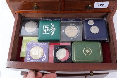 Lot 177 - World - mixed coinage stored in a five draw wood collectables cabinet