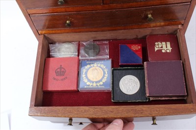 Lot 177 - World - mixed coinage stored in a five draw wood collectables cabinet